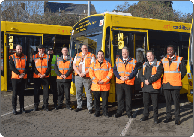 a photo of Cardiff bus staff stood together
